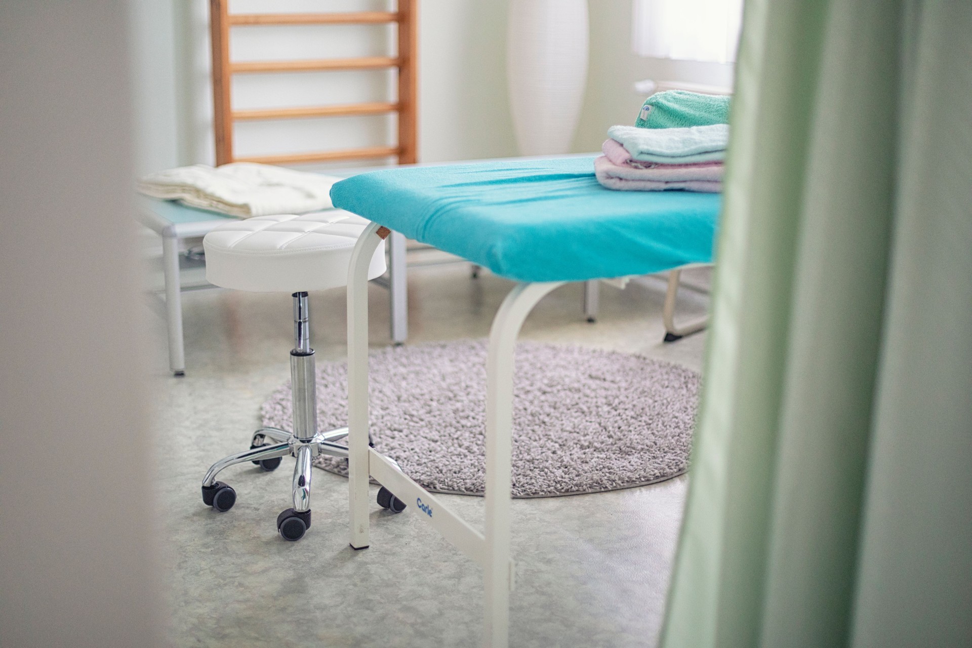 View through the open door of a physiotherapy treatment room